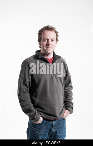 mid length and full length characterful shots of 20 something real people who work in media posing in various poses, laughing, Stock Photo