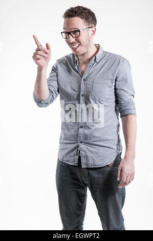 mid length and full length characterful shots of 20 something real people who work in media posing in various poses, laughing, Stock Photo