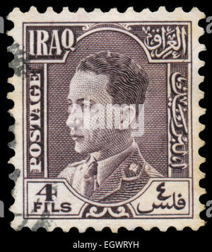 IRAQ - CIRCA 1934: Stamp printed in Iraq shows Ghazi bin Faisal, the King of the Hashemite Kingdom of Iraq, circa 1934 Stock Photo