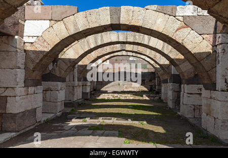Interior of empty corridor with arcs. Ruins of Ancient city Smyrna. Izmir, Turkey Stock Photo