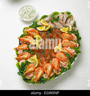 Fish and seafood platter, including gravadlax (salmon), prawn cocktail and smoked eel Stock Photo