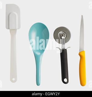 Spatula, large spoon, pizza cutter and sharp knife Stock Photo