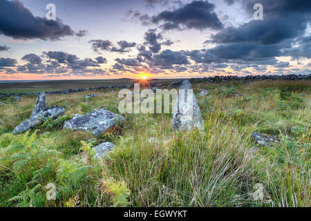 The ruins of ancient neolithic hut circles and field systems on top of Garrow Tor on Bodmin Moor in Cornwall Stock Photo