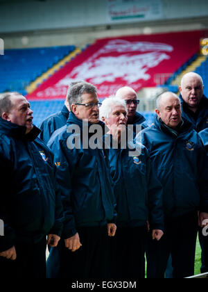 Welsh male voice choir singing at London Welsh rugby match on St. Davids day 2015 Stock Photo