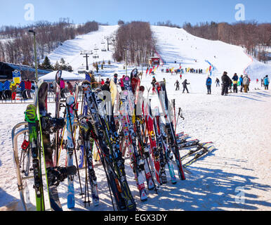 Ontario's Premier Ski Resort  Blue Mountain in Collingwood;Ontario;Canada and the 'Village' in the Winter & many people skiing Stock Photo