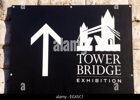 LONDON, UK - MARCH 2ND 2015: A sign showing the way to the Tower Bridge Exhibition in London, on 2nd March 2015.