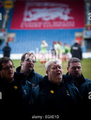 Welsh male voice choir singing at London Welsh rugby match on St. Davids day 2015 Stock Photo