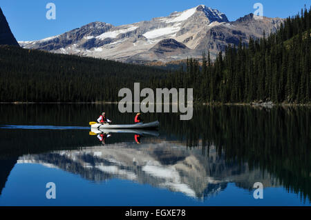 Canoeists on Lake O'Hara Yoho National Park BC Canada Stock Photo