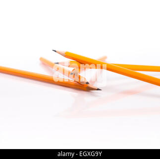 Five Orange Pencils Stacked Stock Photo