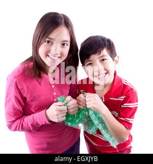 Kids popping bubble wrap. Stock Photo