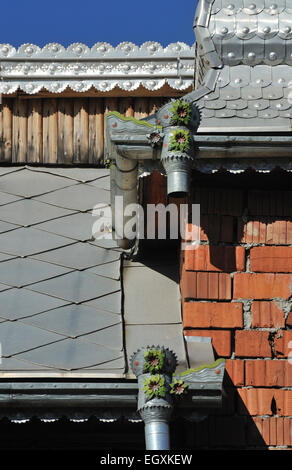 Traditional ornate house of Roma family under construction, Huedin, Romania Stock Photo
