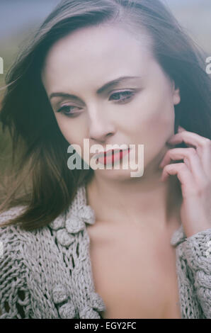 Portrait of a beautiful young woman outdoors Stock Photo