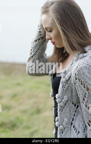 Young woman by the lake Stock Photo