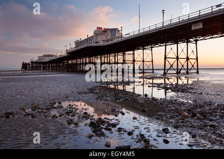 Worthing pier and beach at low tide. West Sussex, England, UK Stock Photo