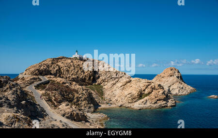 Ile de la Pietra with lighthouse at the tip of L'Île-Rousse, Haute-Corse, Corsica, France Stock Photo