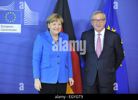 (150304) -- BRUSSELS,  March 4, 2015 (Xinhua) -- European Commission President Jean-Claude Juncker (R) meets with German Federal Chancellor Angela Merkel at EU headquarters in Brussels, Capital of Belgium, March 4, 2015. (Xinhua/Ye Pingfan) Stock Photo