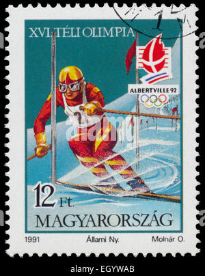 HUNGARY - CIRCA 1991: Stamp printed in Hungary shows Skier at the Winter Olympic Games in Albertville in 1992, circa 1991 Stock Photo