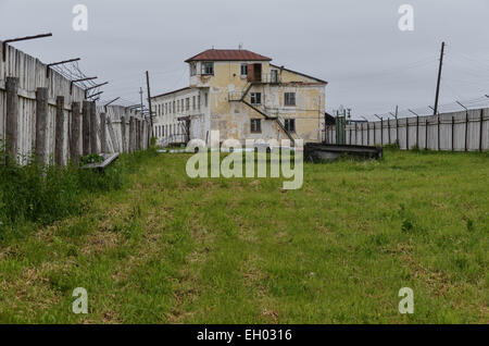 The former soviet gulag camp of Perm36, west of the Ural range in Russia near the town of Perm. Administrative building, fence. Stock Photo