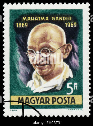 HUNGARY - CIRCA 1969: Stamp printed in Hungary shows an image of Mahatma Gandhi commemorative of the centenary of his birthday,  Stock Photo