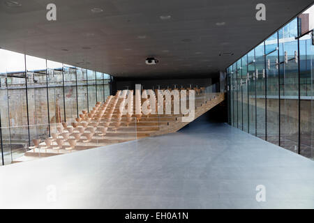 Lecture Theatre in the Maritime Museum of Denmark, M/S Museet for Søfart, Helsingør Denmark. Bjarke Ingels Group BIG. Arne Jacobsen Series 7 chairs. Stock Photo