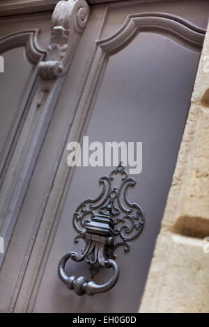 Bronze door knocker of a French mansion Stock Photo