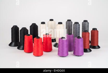Assortment of Industrial Thread on large spools. Stock Photo