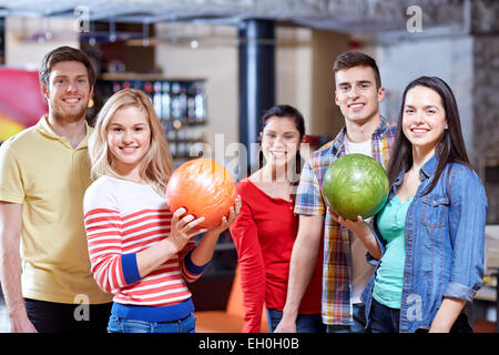 happy friends in bowling club Stock Photo