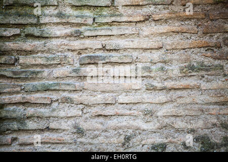 Background photo texture of old weathered gray brick wall Stock Photo
