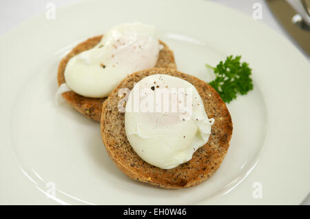 Two poached eggs on toast Stock Photo