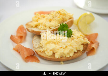 Scrambled eggs on toast with smoked salmon Stock Photo