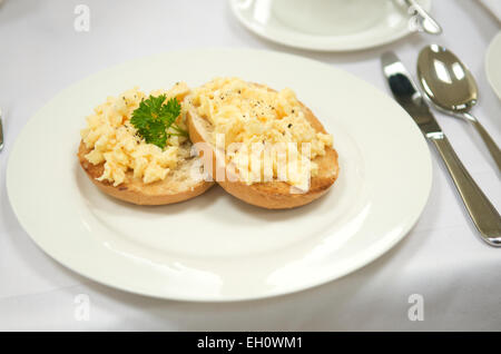 Scrambled eggs on toast Stock Photo