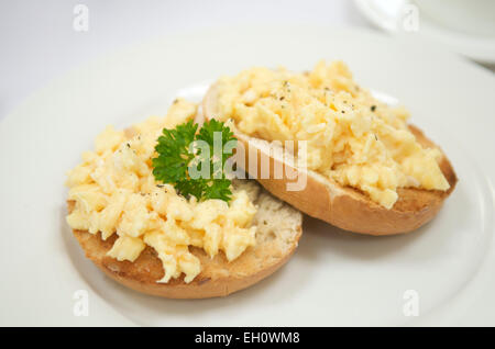 Scrambled eggs on toast Stock Photo
