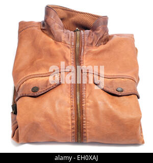 closeup of a folded brown worn leather jacket on a white background Stock Photo