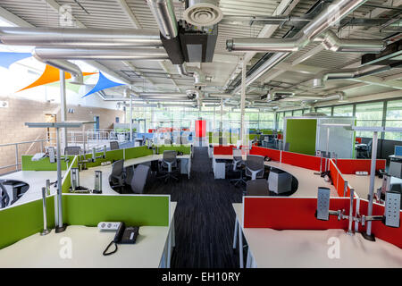 Modern office interior with open plan desking Stock Photo