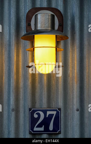 number of a residence with lamp Stock Photo