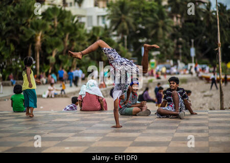 A guy doing some break dance at a popular gathering spot for youth in Mumbai, India Stock Photo