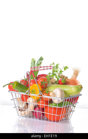 Assortment of fresh vegetables in metal basket Stock Photo