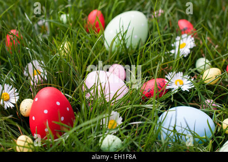 Multicolored Easter eggs in a grass Stock Photo