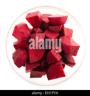 Beetroot wedges in glass bowl isolated on white. Stock Photo