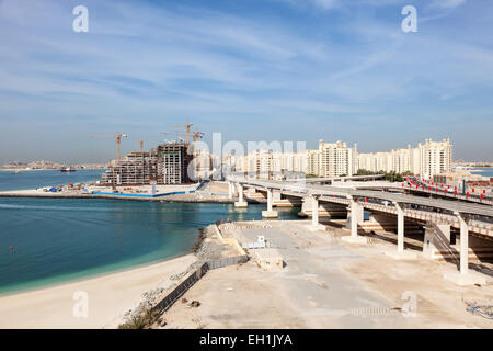 Palm Jumeirah highway, monorail and bridges connecting the Palm with mainland. Dubai, United Arab Emirates Stock Photo