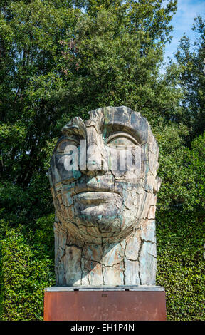 Head of a Roman giant sculpture by Igor Mitoraj in the Boboli Gardens or Giardino di Boboli, Florence, Tuscany, Italy Stock Photo
