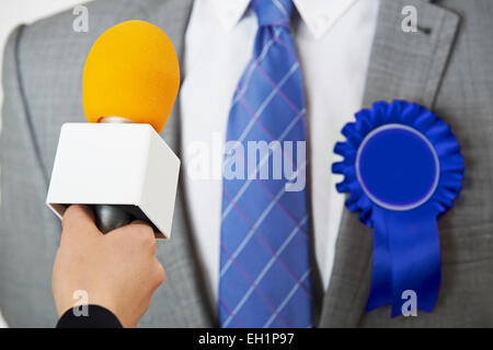 Politician Being Interviewd By Journalist During Election Stock Photo