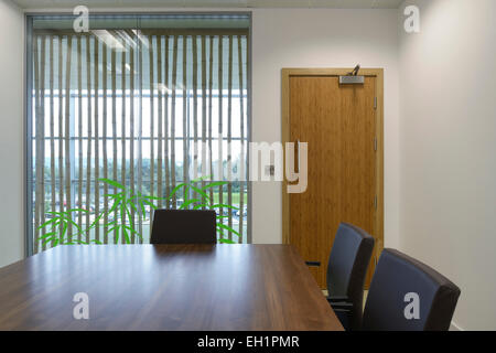 Brown leather chairs at conference table in board room, Fabrick Offices, Hudson Quay, Middlesbrough, UK Stock Photo
