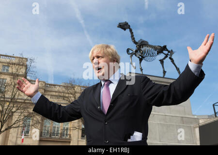 London, UK. 5th March, 2015. Pictured: London Mayor Boris Johnson after the unveiling of the new commission for the Fourth Plinth entitled 'Gift Horse' by German artist Hans Haacke.  The sculpture is a 4.57 metres tall skeleton bronze and weighs 1,700 kg. Stock Photo