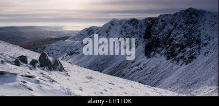 Winter on Dow Crag. Milky winter sky, snowy Dow Crag from Coniston Old Man Stock Photo