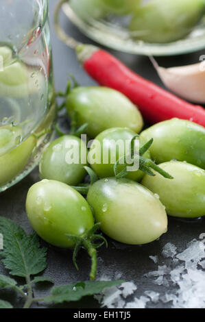 Green tomatoes for pickling. Stock Photo