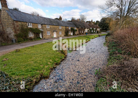 The Caule Bourne stream passes Barrington Row or Winkle Street is part of Calbourne, Isle of Wight Stock Photo