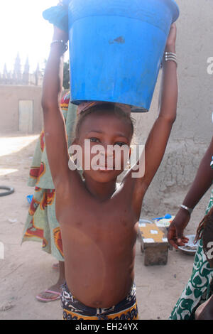 SANGA, MALI - SEPTEMBER 29 , 2008:  Unidentified girl from village in Dogon country on september 29, 2008, Sanga, Mali Stock Photo