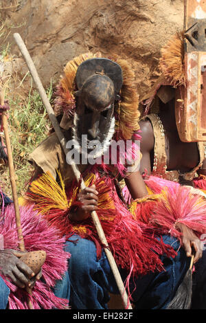 TIRELI, MALI - OCTOBER 2, 2008: Dogon man with his traditional mask on the main square of the village Tireli Stock Photo