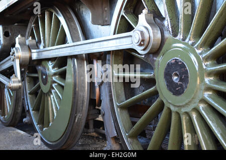 Large steam train wheels and  connecting rods. Stock Photo